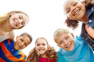 Children smiling during a dental visit at a Lethbridge dental clinic